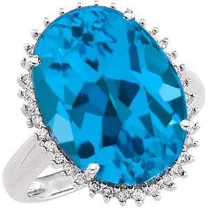 14k White Gold Blue Topaz and Diamond Halo Ring.