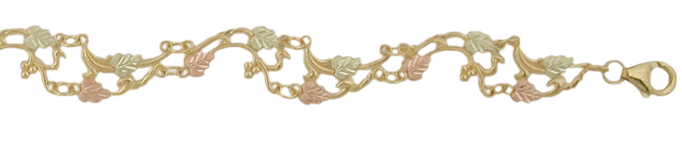 10k yellow gold, 12k rose gold, 12k green gold architecturally detailed Black Hills Gold bracelet.