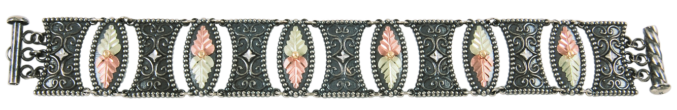 Oxidized sterling silver and two-tone gold Etruscan inspired Black Hills Gold motif bracelet is stunning.