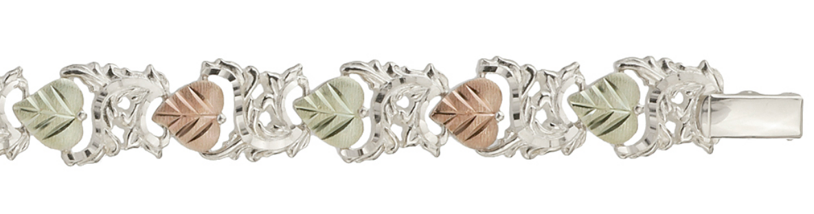 Beautiful grape leaf bracelet in sterling silver, 12k pink gold and 12k green gold.