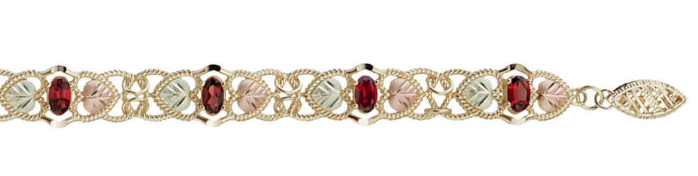 Ruby bracelet in 10k yellow gold, 12k green gold and 12k rose gold in Black Hills Gold motif.