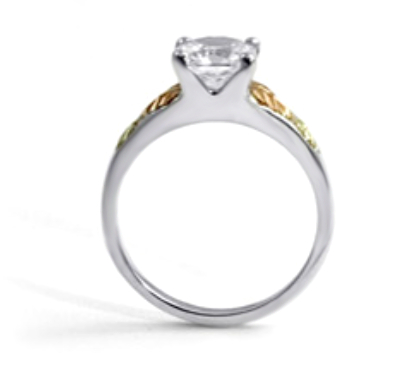 Sterling silver princess cut solitaire cz ring with 12k rose gold and 12k green gold Black Hills Gold motif.