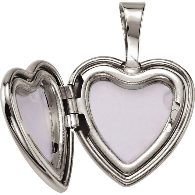 Inside view of the two picture heart and cross locket for women and girls of Christian faith.