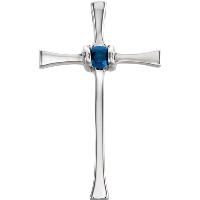 Women's 14k white gold channel-set blue sapphire western cross pendant with a hidden bail.