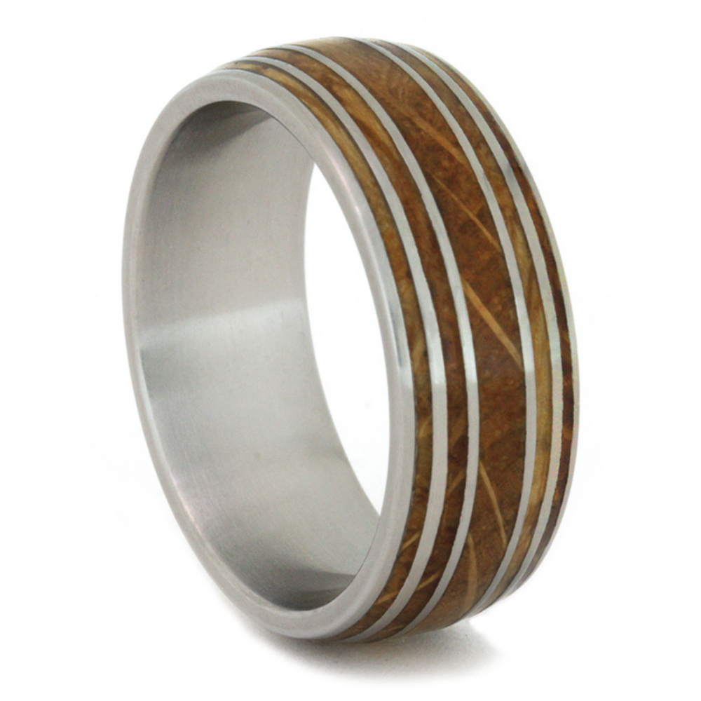 It’s a miniature whiskey barrel for your hand. With eleven distinct bands of alternating titanium and whiskey barrel oak wood, this titanium ring is as iconic as the whiskey the wood barrel once stored. This ring is made from a barrel once used by a Tennessee distillery. Surprise your favorite whiskey aficionado with this whiskey barrel ring.