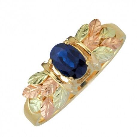 Sapphire Oval Petite Leaf Ring, 10k Yellow Gold, 12k Green and Rose Gold Black Hills Silver Motif. 