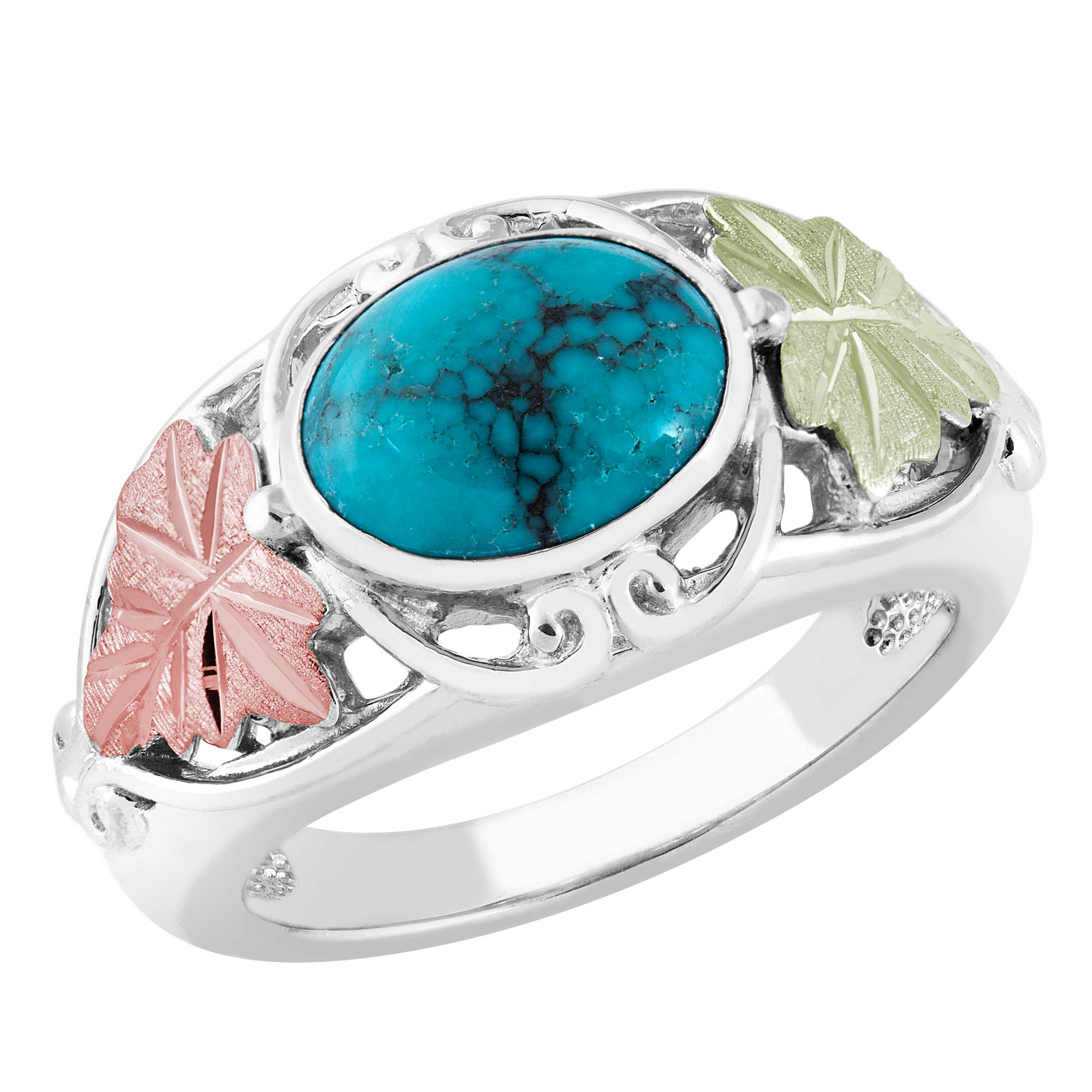 Turquoise ring black hills gold on sterling silver. 