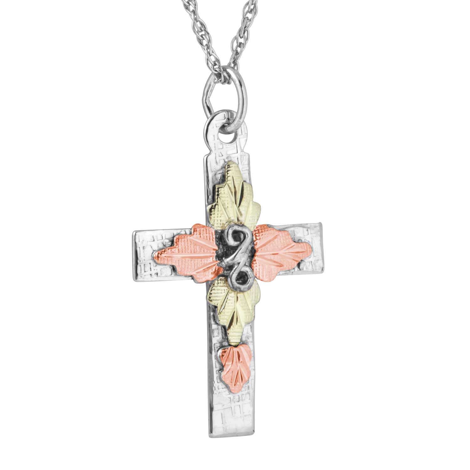 Black hills Gold motif set on Sterling Silver Cross. 