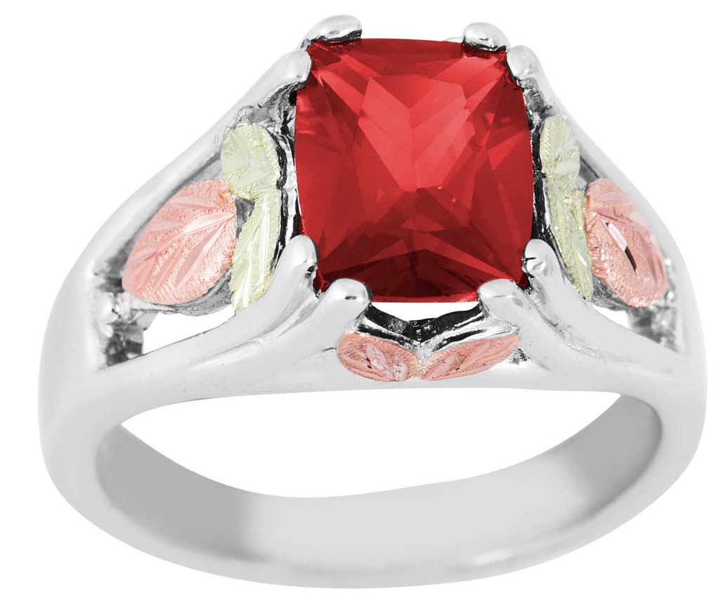 Created Ruby July birthstone ring crafted in rhodium plate sterling silver, 12k green and rose gold.