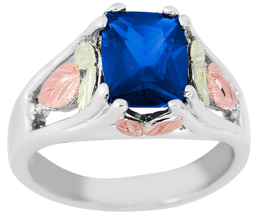 Created Blue Spinel September birthstone ring, Black Hills Gold on rhodium plate sterling silver.
