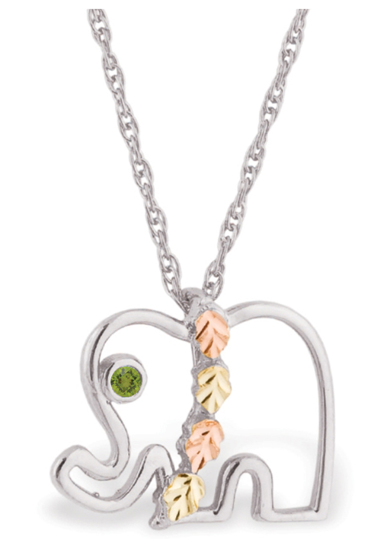 Created Peridot August birthstone rhodium-plated sterling silver pendant necklace is suspended from an 18 inch rope chain.