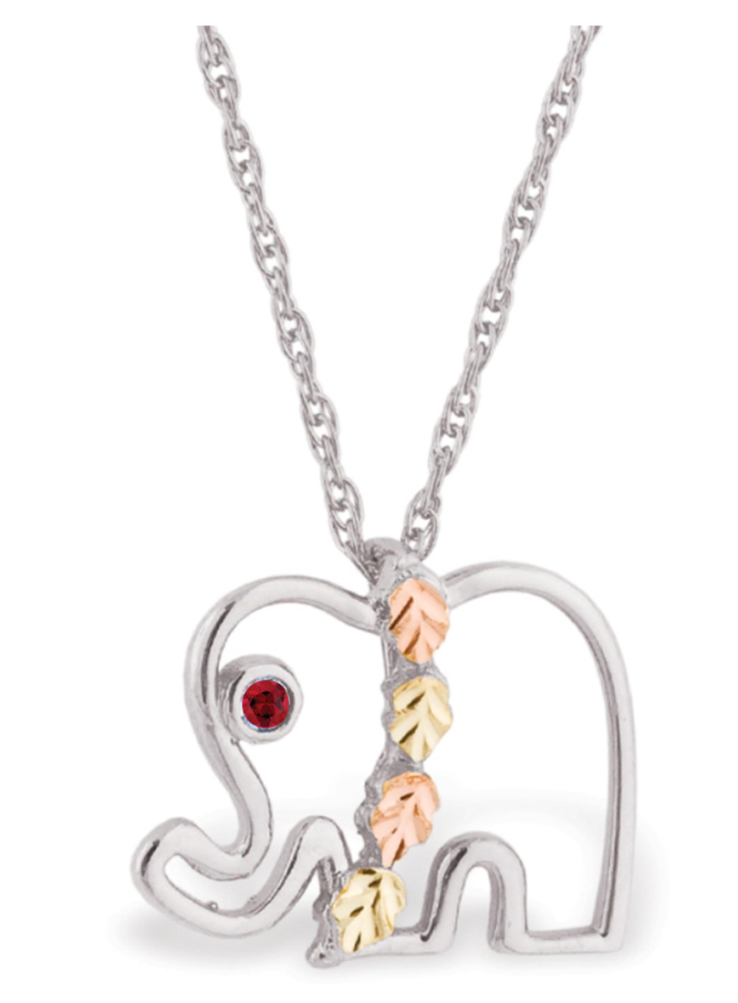 Created Ruby July birthstone rhodium-plated sterling silver pendant necklace is suspended from an 18 inch rope chain.